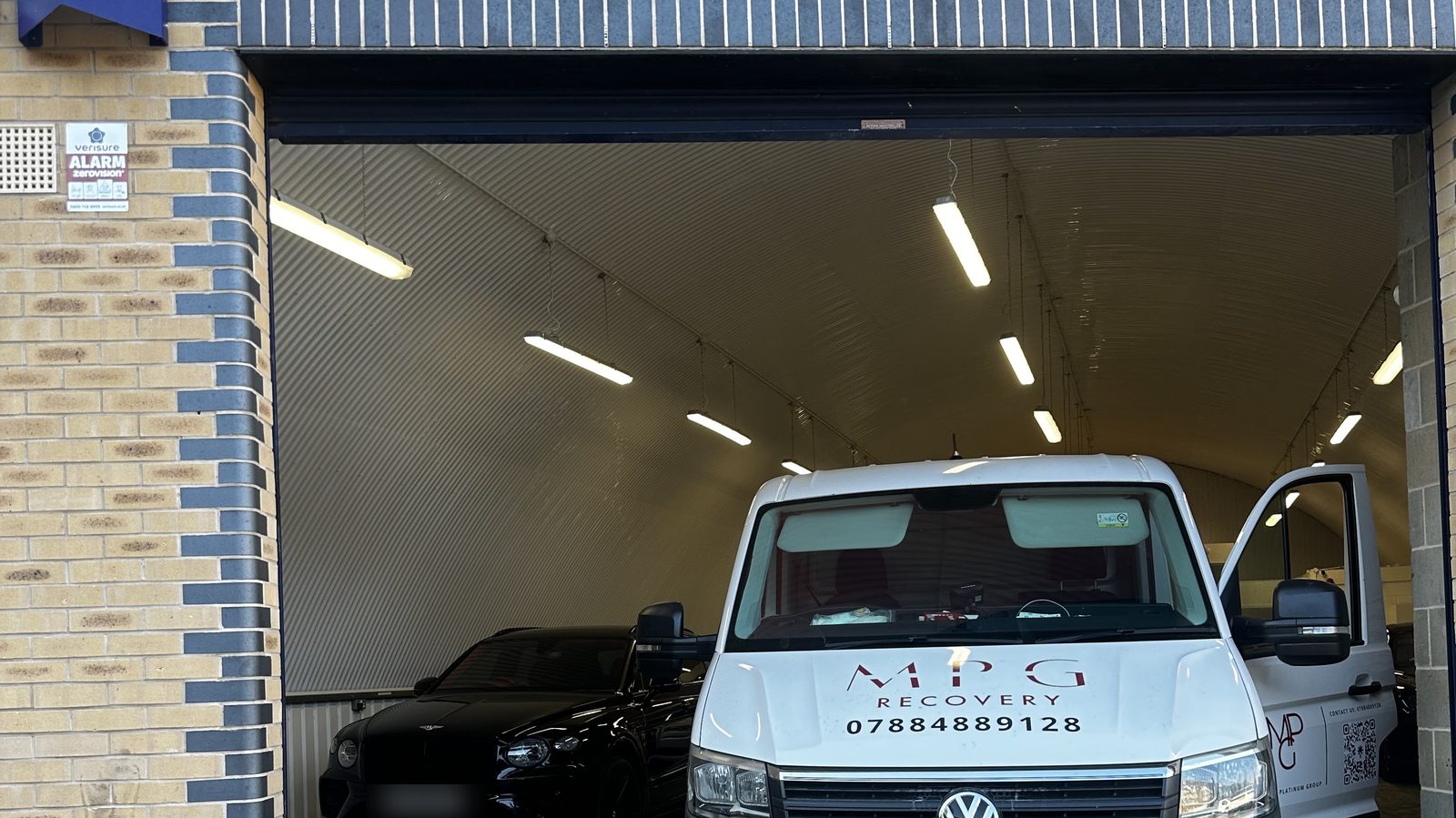 The MPG Recovery van inside the railway arch workshop in E1, East London