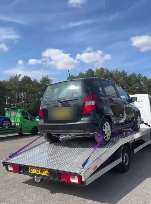 A car loaded at a BCA auction site ready for delivery by MPG Recovery