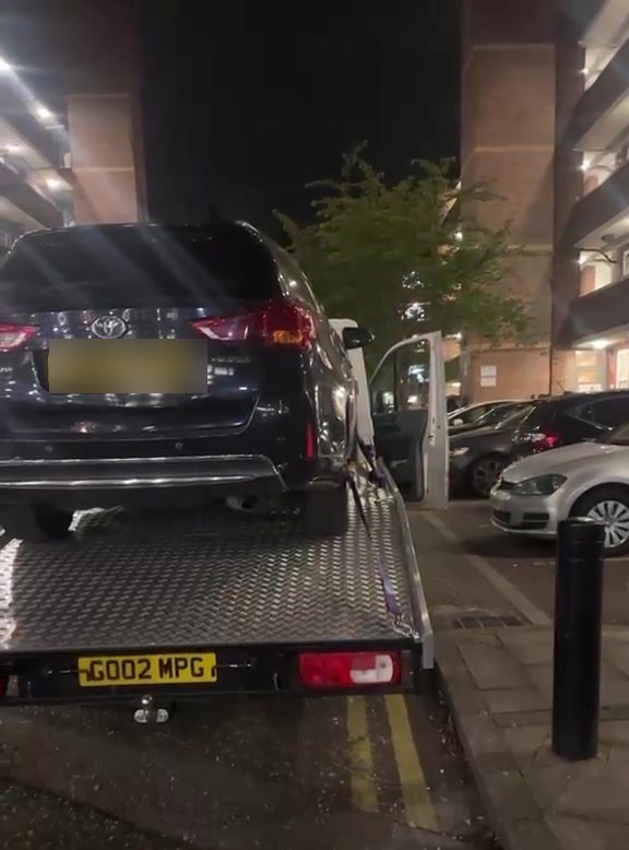 A vehicle collected from a multi-storey car park at night by MPG Recovery