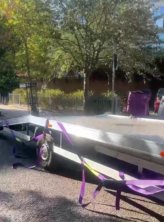 The MPG Recovery tilt-and-slide bed lowered to the road ready to load